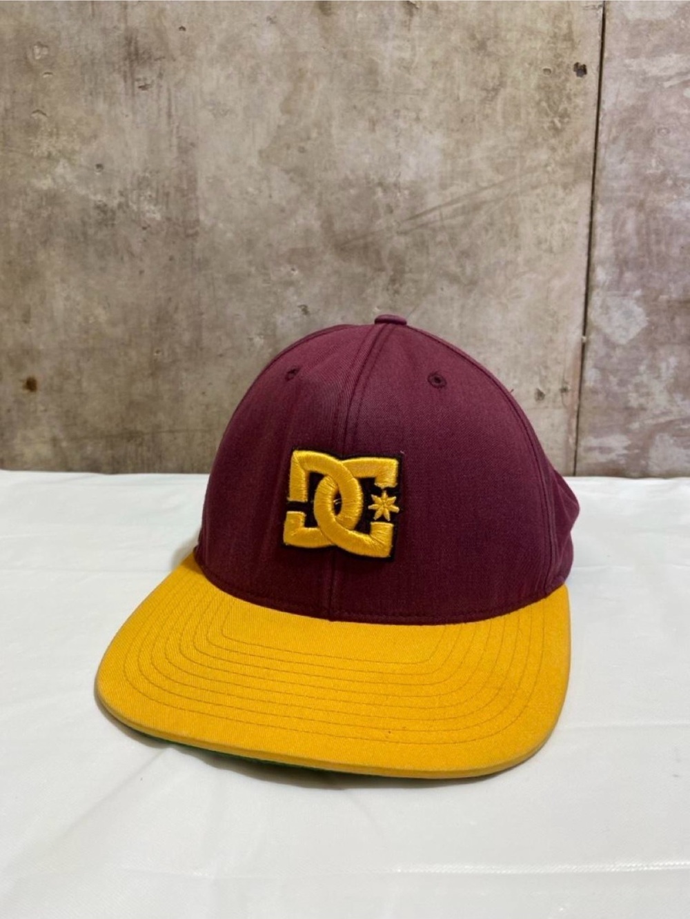 DC Two-Tone Maroon and Yellow Snapback Hat